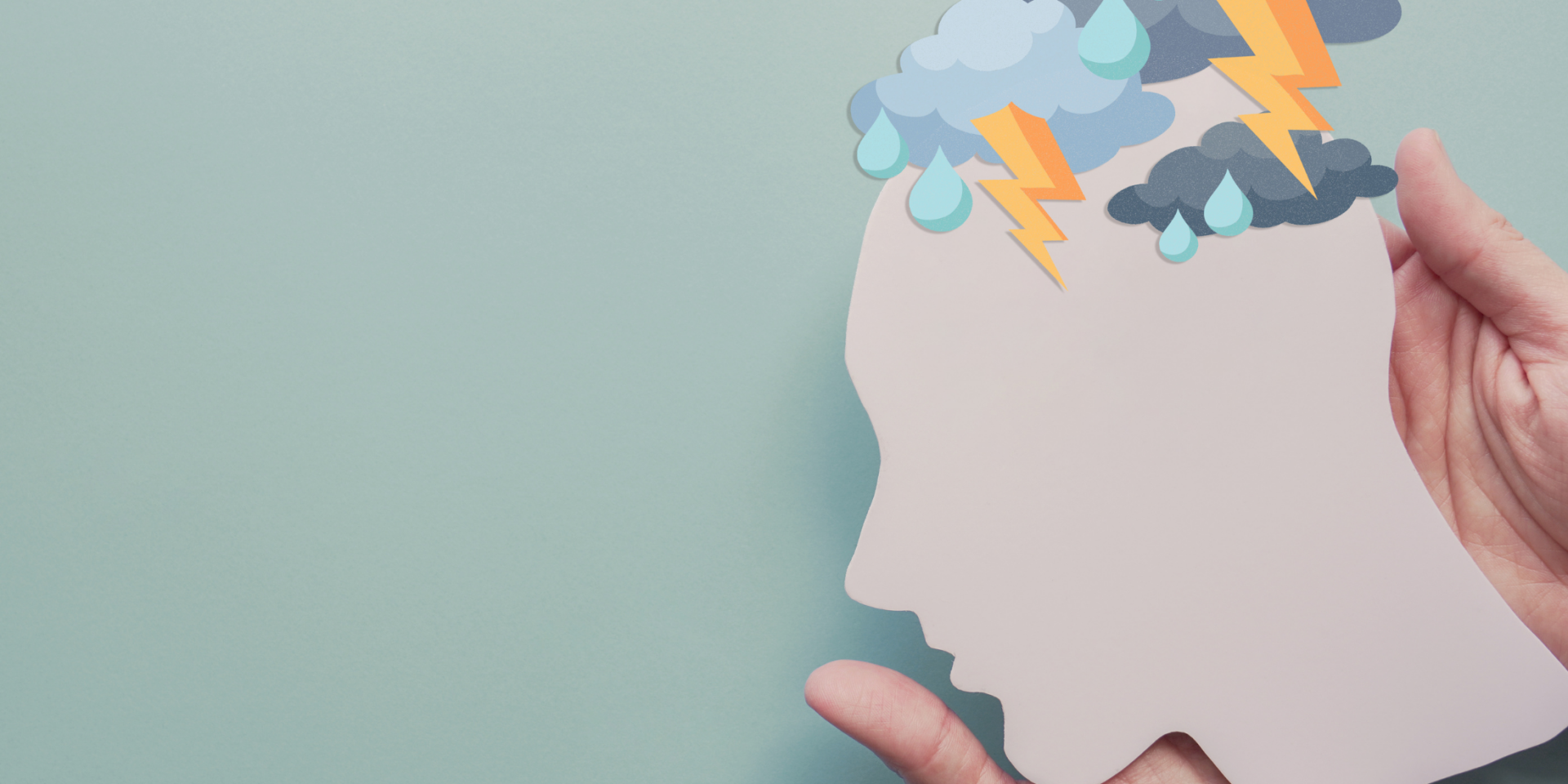 Gewitter im Kopf aus Pappe – Symbolbild für Depressionen